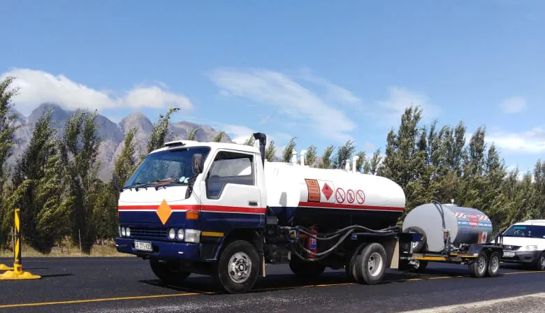 Tanker beside the trees
