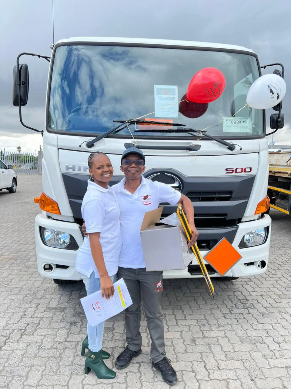 Team beside the Somagidi truck